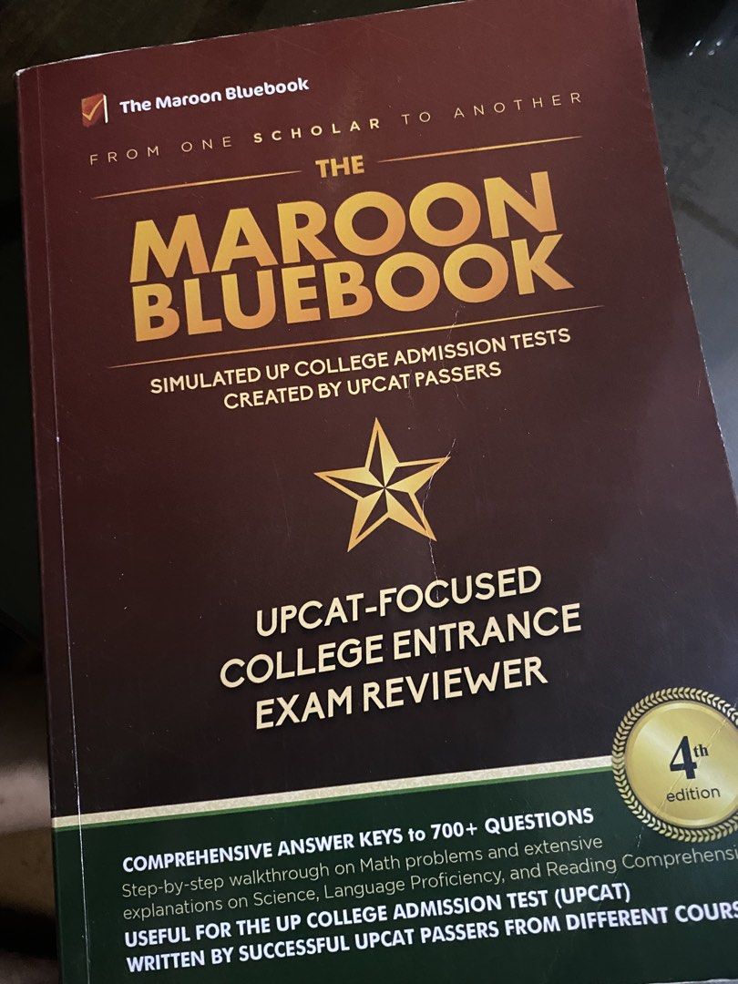 UPCAT Maroon Bluebook 4th Editions (Category: Textbooks) located in Bauang. Submitted by __prelovedbyriri (Listing ID 1449426890, Image 1). Description: - has some dents and scratches but still functional - i only used the language part with pencil .