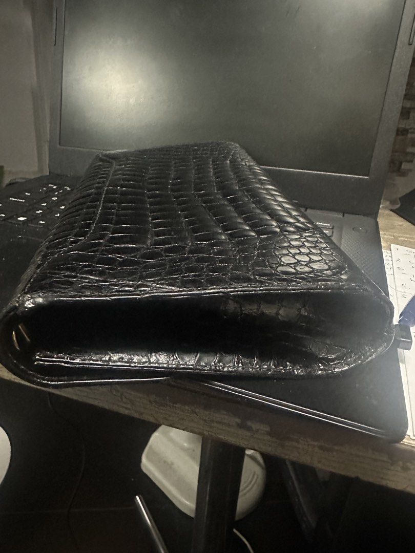 Valentino Black Crocodile Embossed Leather Wallet (Category: Luxury Bags & Wallets) located in Marilao. Submitted by curleylux (Listing ID 1449330128, Image 3). Description: - Genuine black leather wallet - Crocodile embossed finish - Iconic Valentino V logo on front flap - Elegant gold-tone hardware - Ample space for cards and cash - Classic design for everyday elegance.
