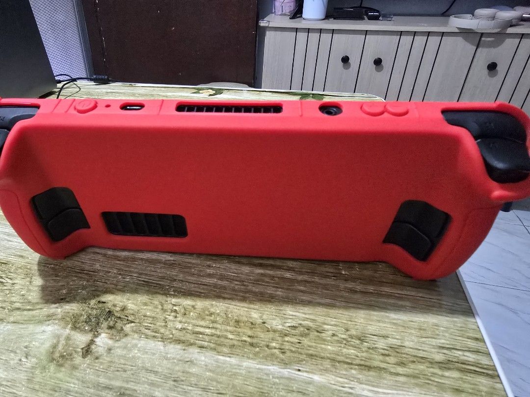 Valve Steam Deck 512GB NVMe SSD Red Case (Category: Others) located in Taguig. Submitted by michaelangelo.ramos04 (Listing ID 1449361984, Image 3). Description: - 512GB OLED Steam Deck - W/ red silicone protective case - Includes a black carrying case - W/ charger -100% Excellent battery health fixed price preffered meet ups BGC, Megamall reason: no time to play busy sa work and madalas sa pc na naglalaro pm me for details 09982942981.