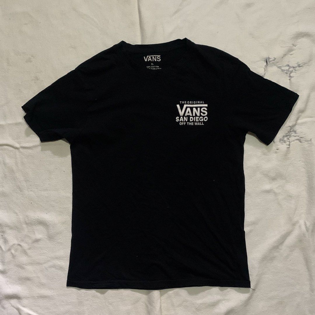 Vans San Diego T-Shirt (Category: Tshirts & Polo Shirts ) located in Bulacan. Submitted by solsic (Listing ID 1449505963, Image 1). Description: - Brand: Vans - Color: Black - Size: XL - Material: 100% Cotton - Design: San Diego graphic on front and back W: 20” L: 28” XL on tag fits Large Well used, perfect for casual attire Issue: crack print Mine: 130 plus SF Courier: J&T/Lalamove. Payment: Gcash / Maribank Meet upSJDM Bulacan up to Sm Tungko S