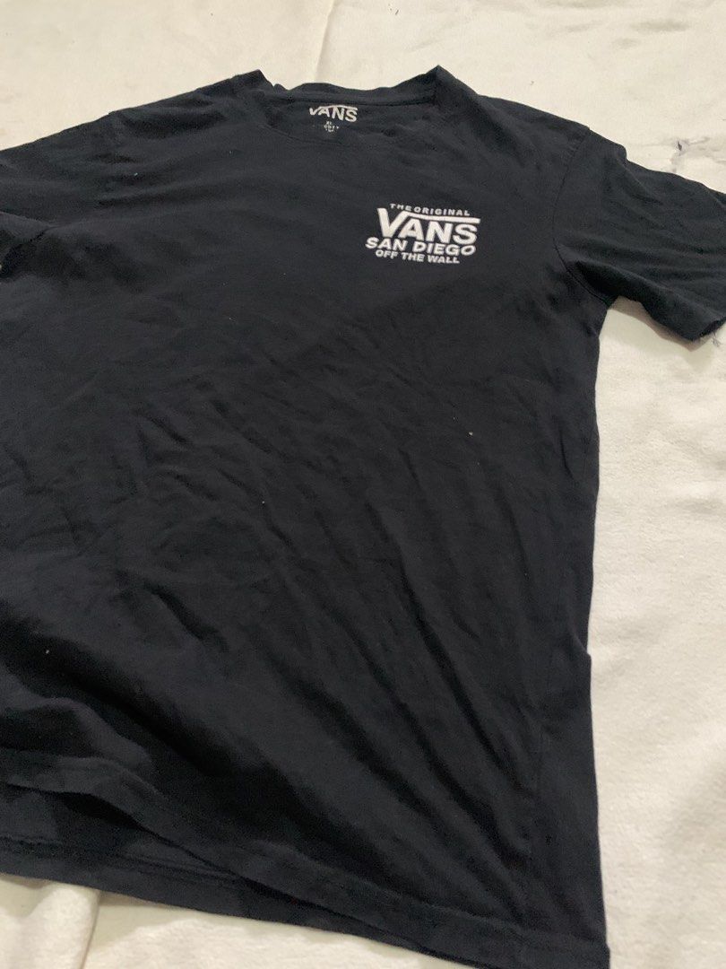 Vans San Diego T-Shirt (Category: Tshirts & Polo Shirts ) located in Bulacan. Submitted by solsic (Listing ID 1449505963, Image 2). Description: - Brand: Vans - Color: Black - Size: XL - Material: 100% Cotton - Design: San Diego graphic on front and back W: 20” L: 28” XL on tag fits Large Well used, perfect for casual attire Issue: crack print Mine: 130 plus SF Courier: J&T/Lalamove. Payment: Gcash / Maribank Meet upSJDM Bulacan up to Sm Tungko S