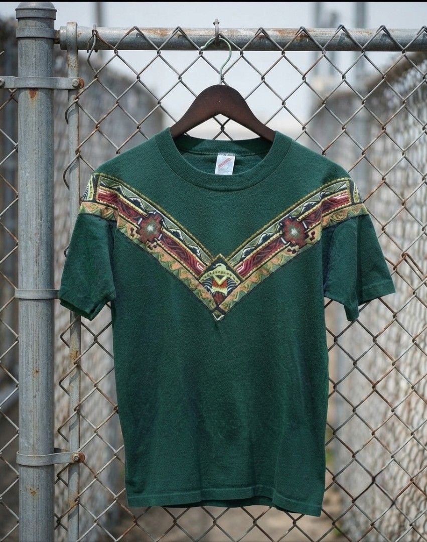 Vintage Green Aztec Patterned Detail - Large (Category: Coats, Jackets and Outerwear) located in Manila. Submitted by darth3pter (Listing ID 1431113983, Image 1). Description: Green Jerzees sweatshirt with patterned detail on the chest and sleeves. Features a crew neck and long sleeves. The tag indicates a size Large. Made in the USA. Actual dimes: 21.5x27 Lrg 1,1,2 Stitching 🚫 Issue.