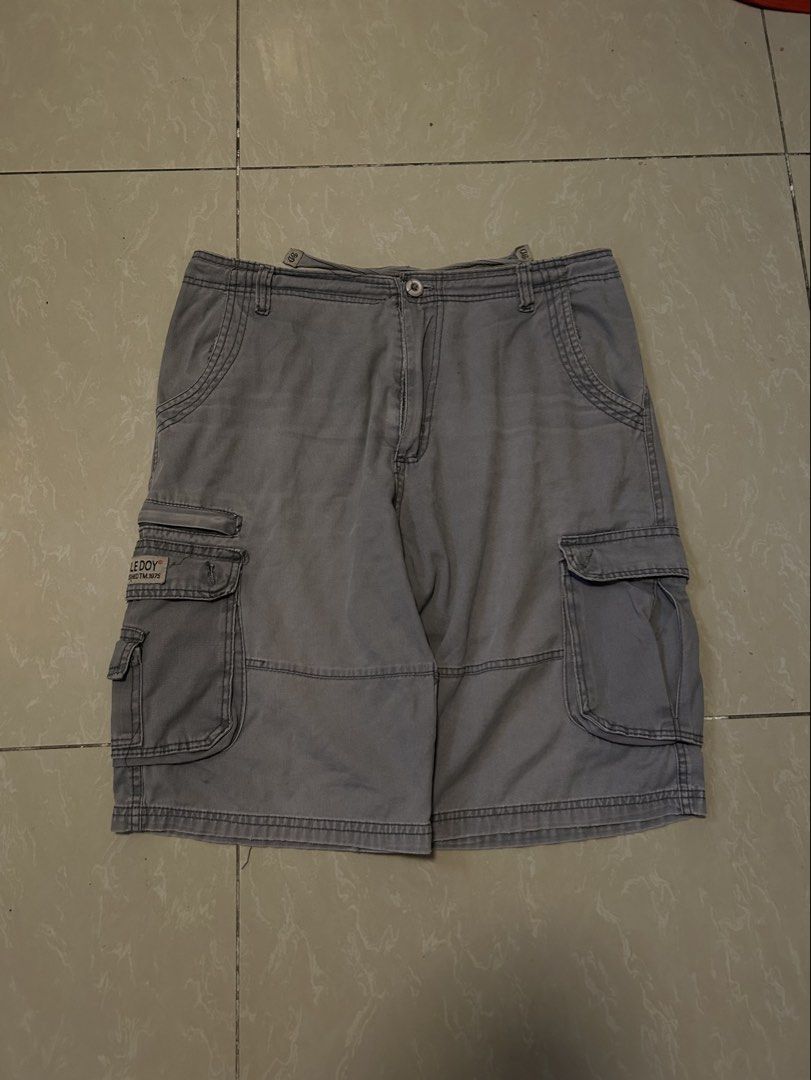 Vintage Grey Cargo Jorts w/ Cool Pockets (Category: Shorts) located in Santa Rosa. Submitted by mandeclutterzzz (Listing ID 1449417266, Image 2). Description: Grey Baggy Vintage Cargo Shorts/Jorts 😍 DIMENSIONS 📏 Length: 22 inches Thigh: 13 inches Leg opening: 12 inches Waist: 32-34 (has drawstrings) small hole in back pocket! tags: vintage, y2k, early 2000’s, alternative, grunge, hip hop, emo, archive, low rise, affliction, 90’s, streetwear, FU