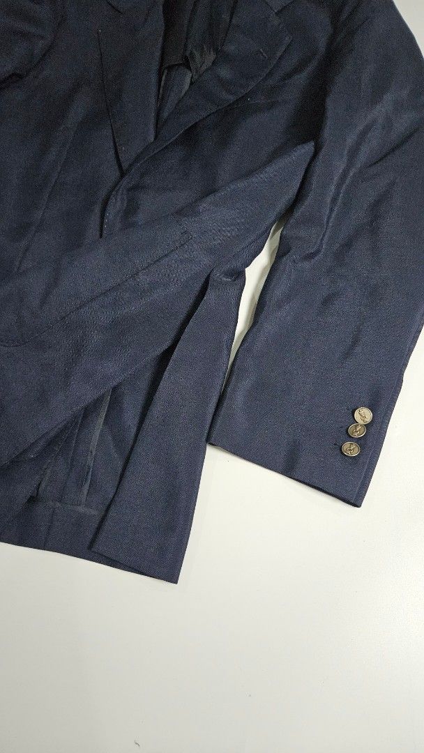 Vintage Lanvin Paris Navy Blue Blazer (Category: Luxury Apparel) located in Alfonso. Submitted by jbcamet (Listing ID 1449492374, Image 3). Description: - Classic navy blue blazer from Lanvin Paris - Features gold-tone buttons with a subtle emblem - Smooth, dark interior lining - Ideal for formal or smart-casual occasions - High-quality, well-made garment.