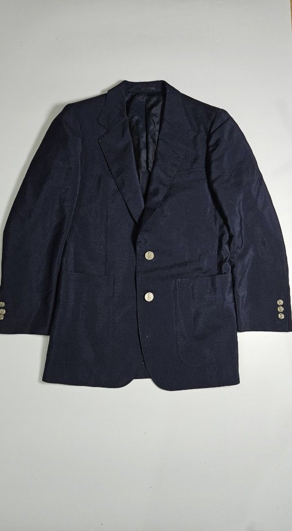Vintage Lanvin Paris Navy Blue Blazer (Category: Luxury Apparel) located in Alfonso. Submitted by jbcamet (Listing ID 1449492374, Image 1). Description: - Classic navy blue blazer from Lanvin Paris - Features gold-tone buttons with a subtle emblem - Smooth, dark interior lining - Ideal for formal or smart-casual occasions - High-quality, well-made garment.