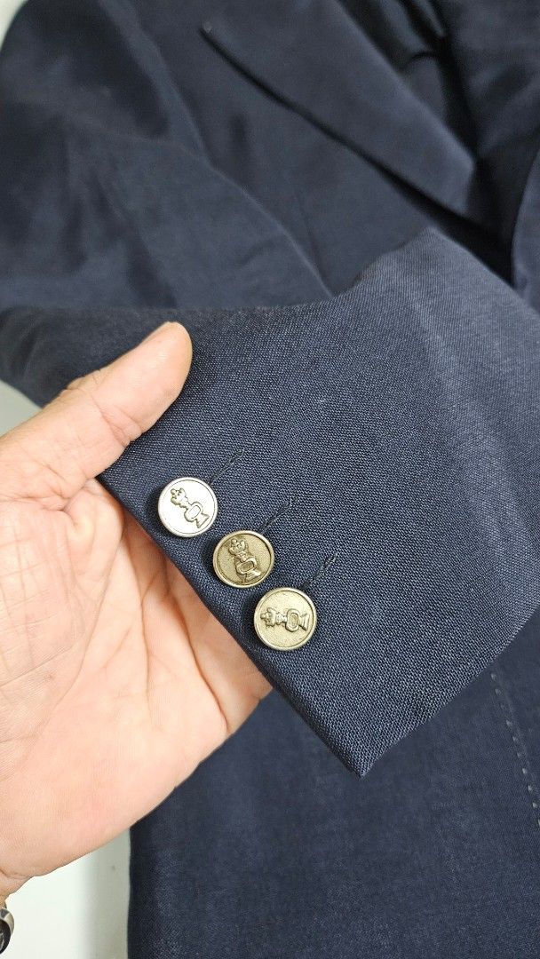 Vintage Lanvin Paris Navy Blue Blazer (Category: Luxury Apparel) located in Alfonso. Submitted by jbcamet (Listing ID 1449492374, Image 2). Description: - Classic navy blue blazer from Lanvin Paris - Features gold-tone buttons with a subtle emblem - Smooth, dark interior lining - Ideal for formal or smart-casual occasions - High-quality, well-made garment.