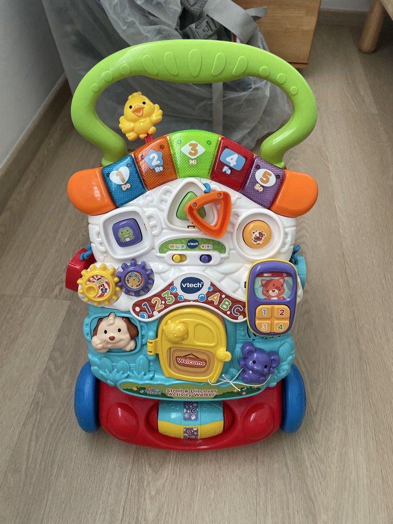 Vtech Walker (Category: Infant Playtime) located in Singapore. Submitted by boldmountain_9e91cc (Listing ID 1449429016, Image 1). Description: - Designed to encourage early walking and play. - Features interactive elements for baby's engagement. - Ready for its next adventure with a new family. Selling because my baby has outgrown it. sell collect from Yishun .