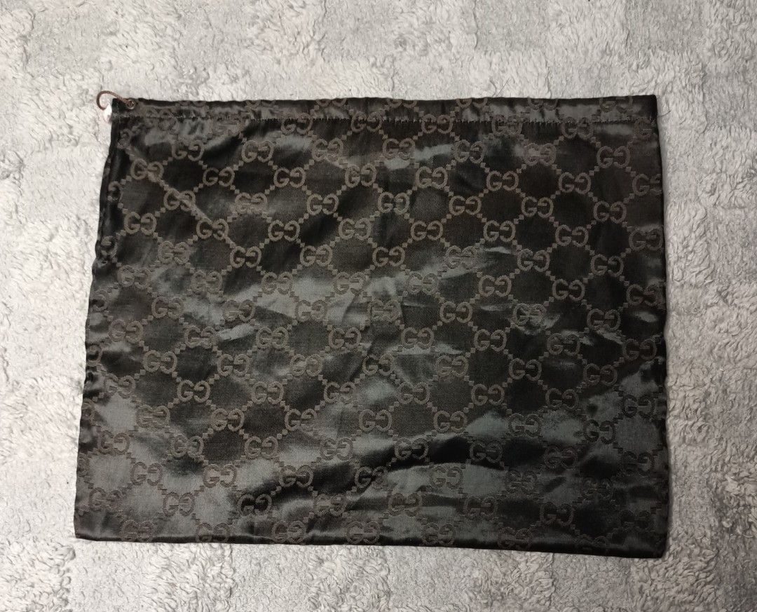 Vtg gucci monogram satin dust bag (Category: Luxury Bags & Wallets) located in Asingan. Submitted by arnelpalaris8 (Listing ID 1449482672, Image 1). Description: Vtg gucci monogram satin brown Dust bag 14.5 width 11.5 Length Verygood condition PM ME.