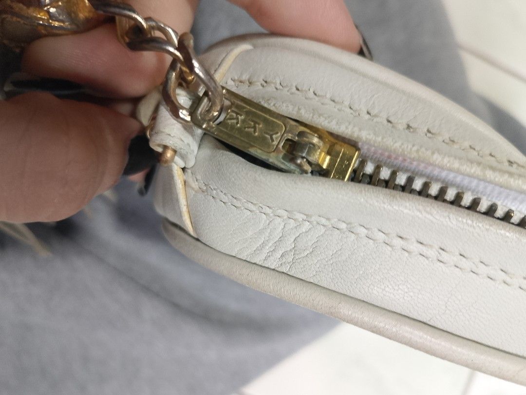 White Chanel CC Tassel Shoulder Bag (Category: Luxury Bags & Wallets) located in Manila. Submitted by sheshe.888 (Listing ID 1449413647, Image 3). Description: - White leather shoulder bag - Gold chain strap - Iconic CC logo detail - Tassel accent - Secure zipper closure - Interior zip pocket - Ideal for carrying your essentials - preloved.