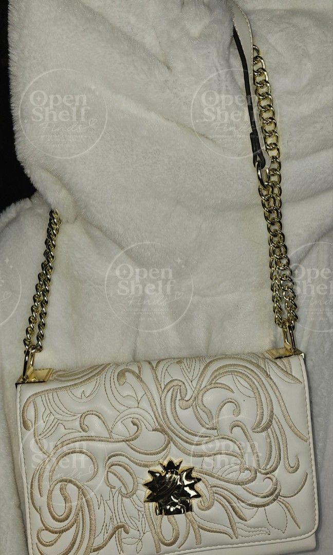 White Embroidery Crossbody / Shoulder Bag (Category: Cross-body Bags) located in Baguio. Submitted by openshelf_findsph (Listing ID 1449370116, Image 2). Description: ‼️PLEASE READ 😊 Condition: Slightly used. No damages. Has some red stains on the inner leather lining, but not visible from the outside. ✨️ Color: White ✨️ Elegant 2-in-1 bag that can be used as a shoulder bag or crossbody bag ✨️ 3 spacious compartments for better organization ✨️ M