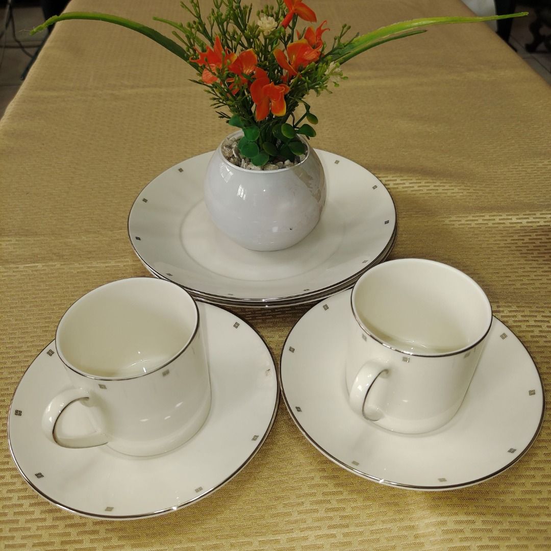 White Teacup and Saucer Set with Cake Plates Set (Category: Coffee & Tea Tableware) located in Pasig City. Submitted by novashelf (Listing ID 1449372500, Image 1). Description: ● Unused or New with the original box ● Japan ● Teacup Rim Diameter: 7.5 cm/2.8 inches Height: 7.3 cm/2.6 inches ● Saucer Diameter: 14.7 cm/5.6 inches ● Cake Plate Diameter: 20 cm/7.6 inches ● Non-microwavable ● Dishwasher unsafe Note: A little discoloration may be due to 
