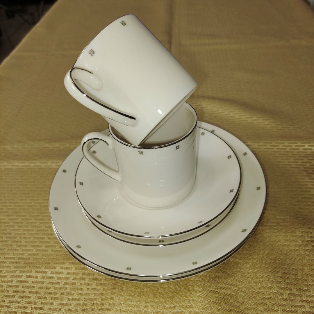 White Teacup and Saucer Set with Cake Plates Set (Category: Coffee & Tea Tableware) located in Pasig City. Submitted by novashelf (Listing ID 1449372500, Image 2). Description: ● Unused or New with the original box ● Japan ● Teacup Rim Diameter: 7.5 cm/2.8 inches Height: 7.3 cm/2.6 inches ● Saucer Diameter: 14.7 cm/5.6 inches ● Cake Plate Diameter: 20 cm/7.6 inches ● Non-microwavable ● Dishwasher unsafe Note: A little discoloration may be due to 