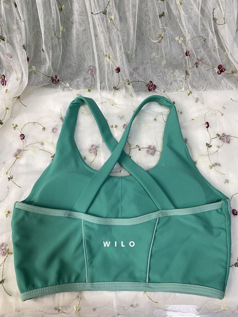 WILO Activewear (Category: Activewear) located in Taytay. Submitted by cami0110 (Listing ID 1449478708, Image 2). Description: - Teal ribbed sports bra from WILO Active - Features a stylish criss-cross back design - Supportive underbust band for a secure fit - Made from a comfortable nylon and spandex blend - Versatile for workouts or everyday casual wear.