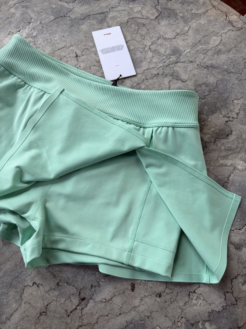 Wilson Tennis Skirt (Category: Skirts) located in Quezon City. Submitted by lovedbysia (Listing ID 1449433803, Image 3). Description: - Brand: Wilson - Color: Mint Green - Size: Medium (M) - Condition: Used once - Features: Built-in shorts, ball pocket - Ideal for: Tennis, other sports.