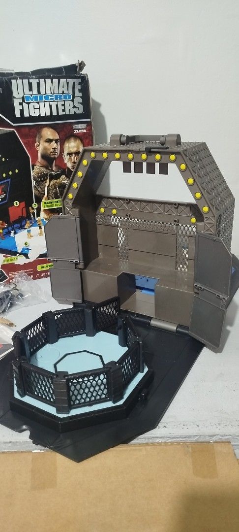 WWE FlexForce Ring & UFC Ultimate Fighters Playset (Category: Action & Battle Toys) located in Baguio. Submitted by highland_finds (Listing ID 1449441516, Image 3). Description: FS: WWE Flex force money in the bank Ring New Complete Sealed accessories Tested/working Issue: box P5k UFC Ultimate Fighters micro New Complete Sealed accessories Issue: box P5k WEC championship belt New Issue: box P1.5k Set: P9k Just DM📩 for more info..