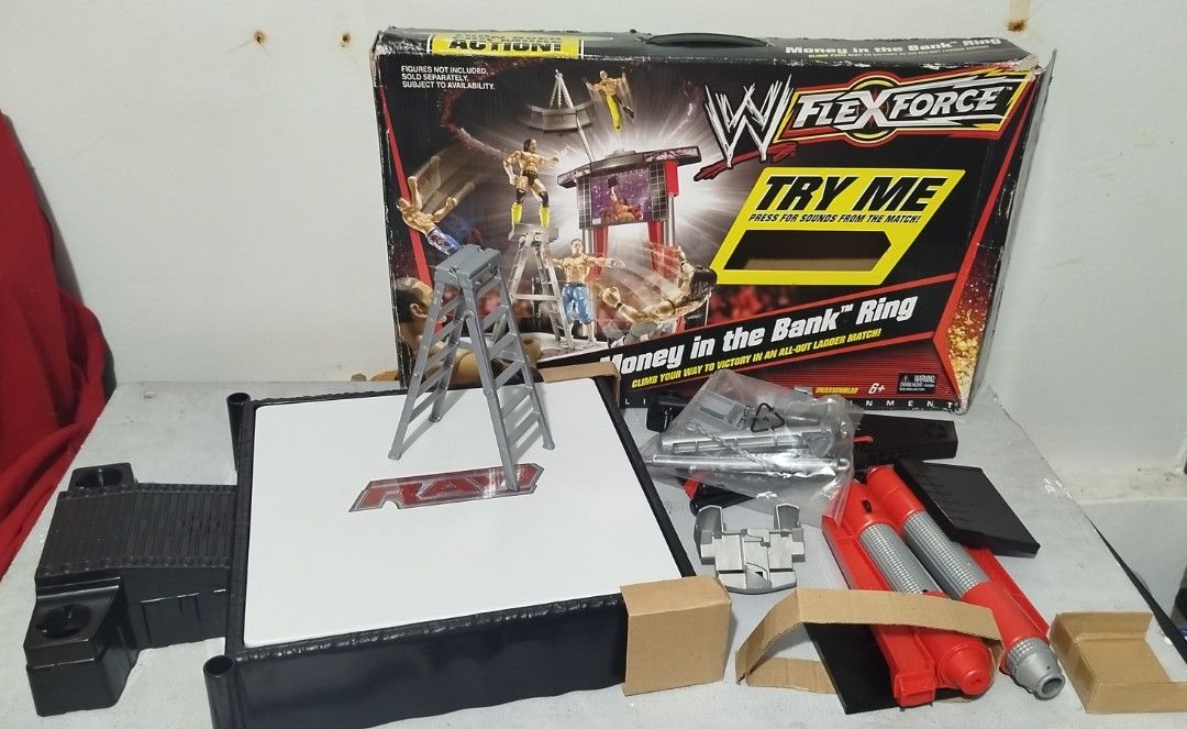 WWE FlexForce Ring & UFC Ultimate Fighters Playset (Category: Action & Battle Toys) located in Baguio. Submitted by highland_finds (Listing ID 1449441516, Image 2). Description: FS: WWE Flex force money in the bank Ring New Complete Sealed accessories Tested/working Issue: box P5k UFC Ultimate Fighters micro New Complete Sealed accessories Issue: box P5k WEC championship belt New Issue: box P1.5k Set: P9k Just DM📩 for more info..