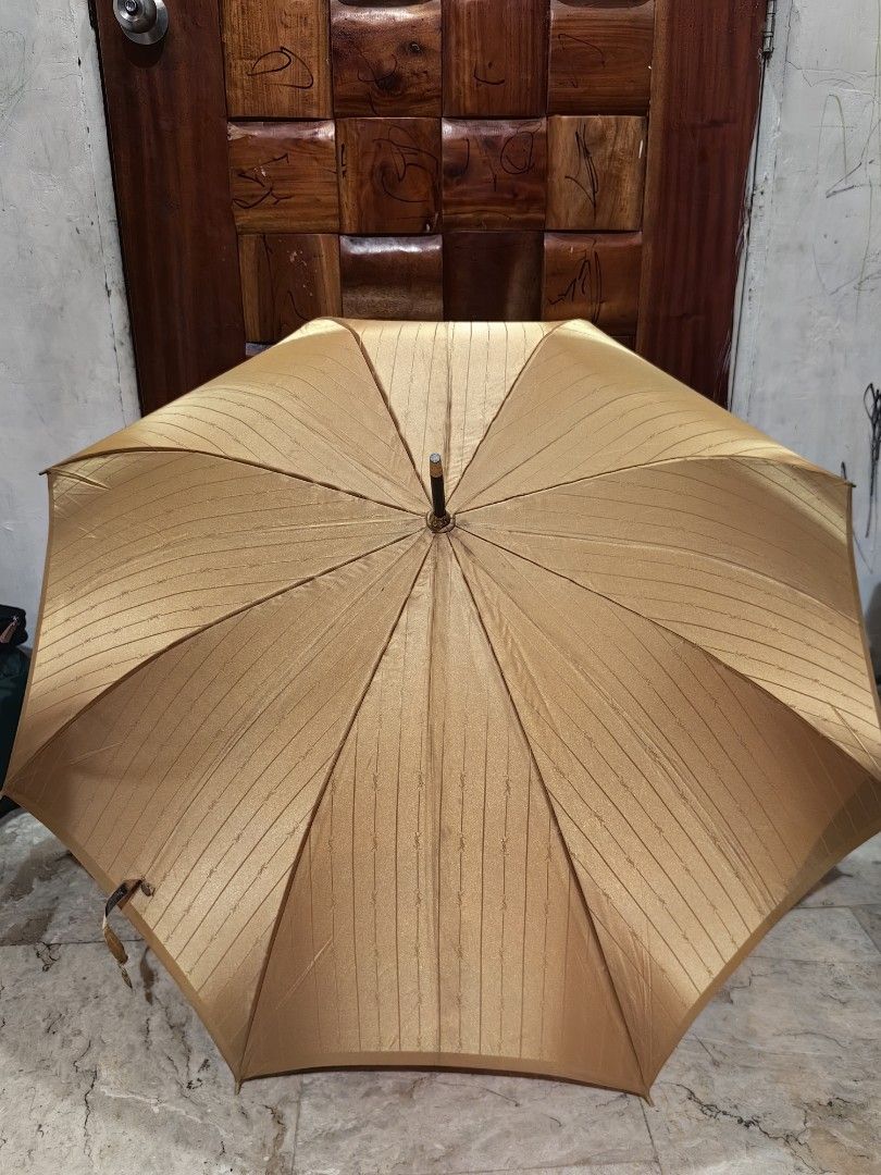Ysl gold umbrella (Category: Umbrellas) located in Calamba. Submitted by princesspauliney. (Listing ID 1449490587, Image 1). Description: YSL GOLD UMBRELLA No tarnish on all the metal💯 Malinis💯 Maganda💯 Legit kahit sa mismong tela may YSL. 💯 Brand new may plastic pa 💯 1150 only.