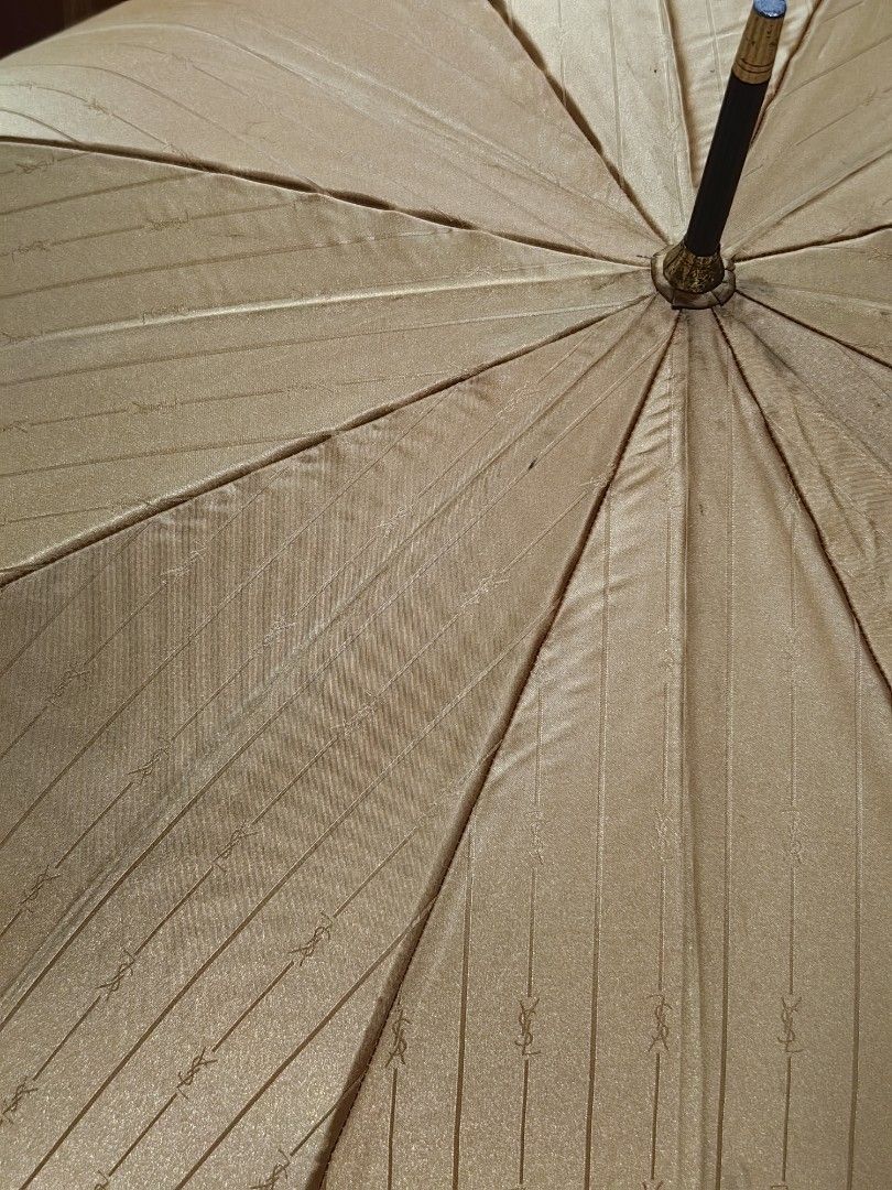 Ysl gold umbrella (Category: Umbrellas) located in Calamba. Submitted by princesspauliney. (Listing ID 1449490587, Image 2). Description: YSL GOLD UMBRELLA No tarnish on all the metal💯 Malinis💯 Maganda💯 Legit kahit sa mismong tela may YSL. 💯 Brand new may plastic pa 💯 1150 only.