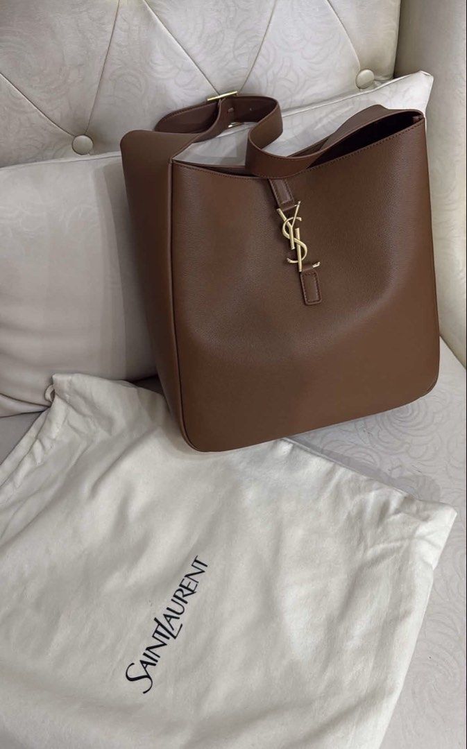 YSL Le 5 à 7 Hobo Bag (Category: Luxury Bags & Wallets) located in Quezon City. Submitted by lavieluxe08 (Listing ID 1449425381, Image 2). Description: Saint Laurent Le 5 à 7 Hobo Bag – Cinnamon Grained Leather | Japan Preloved ✨ A modern icon of understated luxury, the Saint Laurent Le 5 à 7 Hobo Bag blends minimalist elegance with everyday functionality. Crafted in luxurious grained leather and finished with the iconic Cassandre hook closure, t