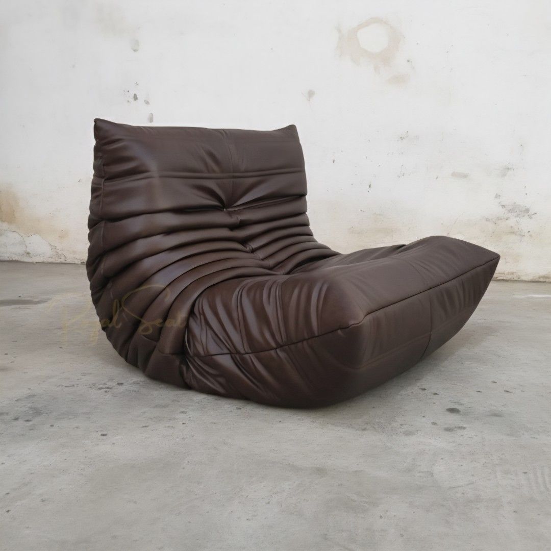 1 Seater German leather Togo Sofa (Category: Sofas) located in Manila. Submitted by allennn.23 (Listing ID 1449591628, Image 2). Description: Pre order 1 week only Dimensions: H 75cm W 100cm L 90cm direct pagawaan RoyalSeat.