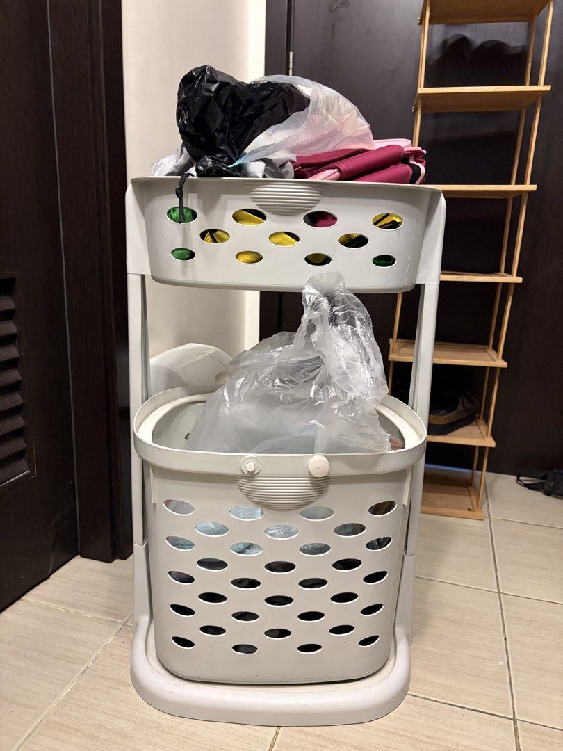 2-Tier White Laundry Basket with Wheels (Category: Laundry Baskets) located in Paranaque City. Submitted by lexbunny (Listing ID 1449582666, Image 2). Description: - White 2-tier laundry basket - Features wheels for easy mobility - Top basket is removable - Ideal for organizing laundry or other items - Space-saving design, perfect for small areas Things inside not included.