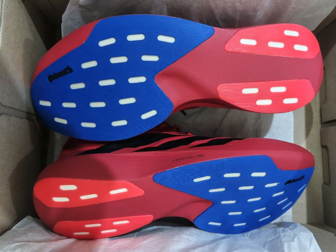 Adidas Adizero EVO SL (Category: Sneakers) located in Bacoor. Submitted by nmcave (Listing ID 1449698716, Image 3). Description: RARE COLORWAY SIZE 12 US - Adidas Adizero EVO SL running shoes - Color: Bright Red with Black Stripes - Features Continental rubber outsole for superior grip - Designed for speed and lightweight performance - Ideal for racing and fast training runs - Comes in original box.