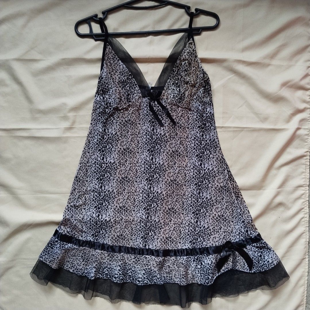 Animal Print Dress (Category: Evening dresses & gowns) located in Daraga. Submitted by timeless_thread (Listing ID 1449611269, Image 1). Description: Slightly see through.