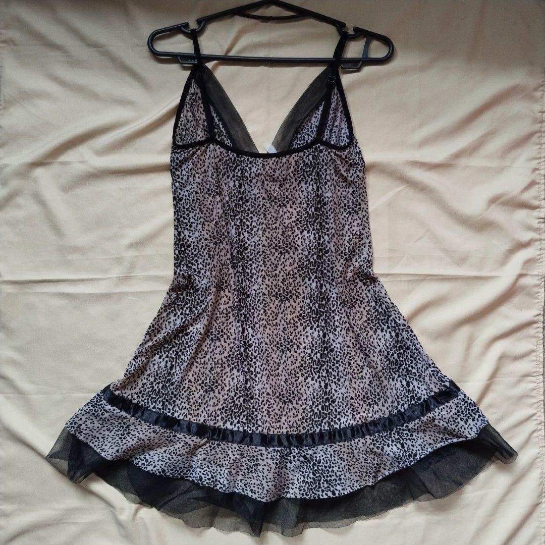 Animal Print Dress (Category: Evening dresses & gowns) located in Daraga. Submitted by timeless_thread (Listing ID 1449611269, Image 3). Description: Slightly see through.