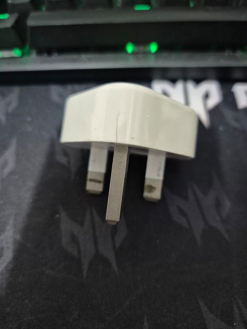 Apple 5W USB Power Adapter Plug (UK) (Category: Cables & Adaptors) located in Manila. Submitted by zotag (Listing ID 1449698987, Image 3). Description: - Original Apple power adapter plug - Designed by Apple in California, Made in China - Model A1399 - Input: 100-240V~50/60Hz 0.15A - Output: 5V 1A - Standard UK 3-pin plug - Compatible with any USB charging cable.