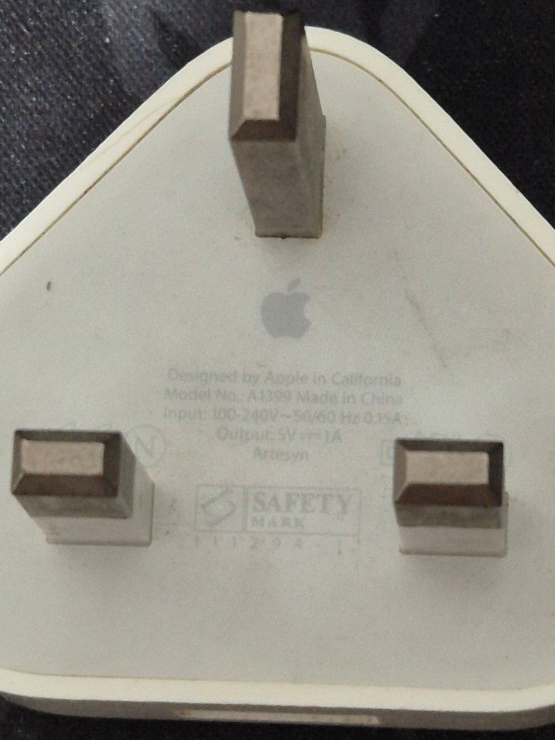 Apple 5W USB Power Adapter Plug (UK) (Category: Cables & Adaptors) located in Manila. Submitted by zotag (Listing ID 1449698987, Image 2). Description: - Original Apple power adapter plug - Designed by Apple in California, Made in China - Model A1399 - Input: 100-240V~50/60Hz 0.15A - Output: 5V 1A - Standard UK 3-pin plug - Compatible with any USB charging cable.