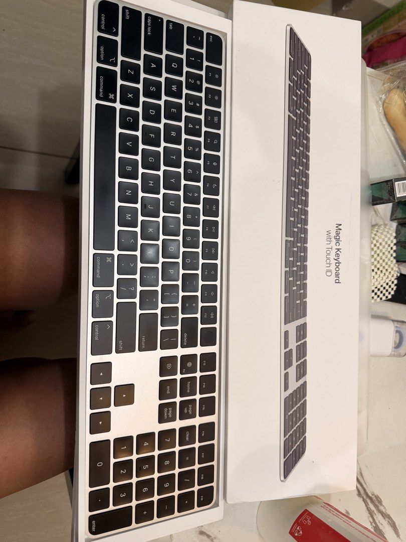 Apple Magic Keyboard with Touch ID and Numeric Keypad (Category: Computer Keyboard) located in Quezon City. Submitted by james_matthew97 (Listing ID 1449738091, Image 3). Description: - Apple Magic Keyboard with Touch ID and Numeric Keypad - US English layout with black keys - Optimized for Mac models with Apple silicon - Rechargeable via Lightning to USB-C cable - Enhances productivity and everyday use - Comes in original packaging.