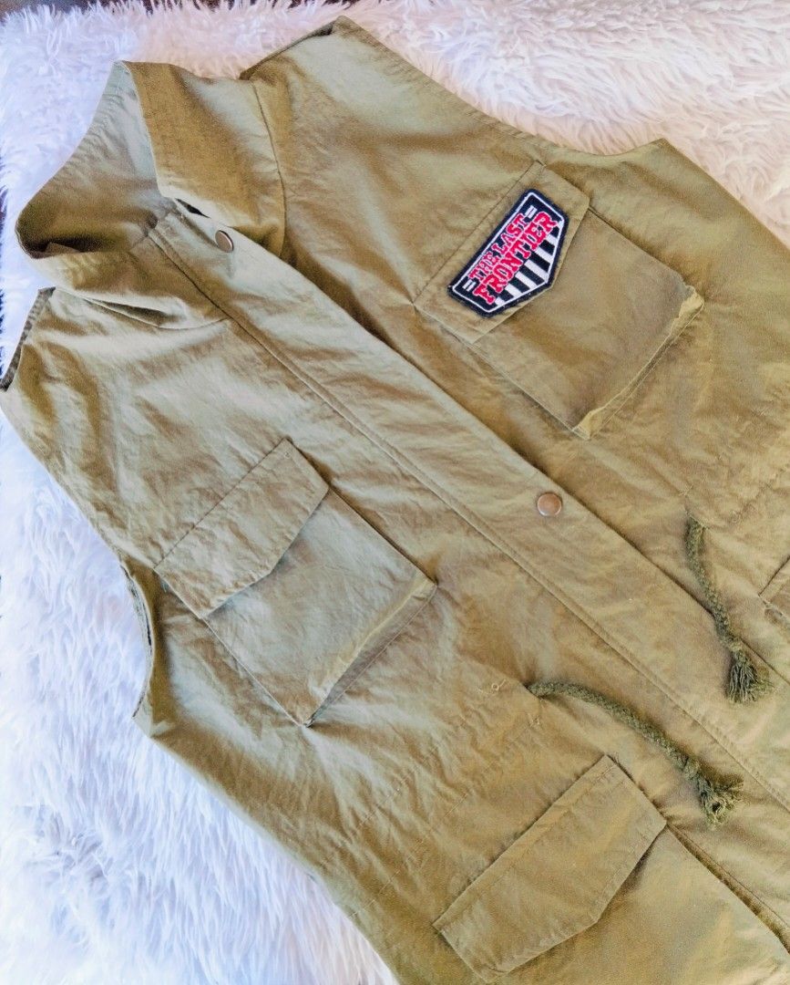 army green punk skull nylon vest (Category: Vests) located in Arakan. Submitted by thrift_ala_king (Listing ID 1449576557, Image 2). Description: 4 pockets front view can be worn during hiking,camping, or as costume size M mens size L womens no brand 55% cotton 45% polyester has adjustable waist strap for womens dm me 150+sf.