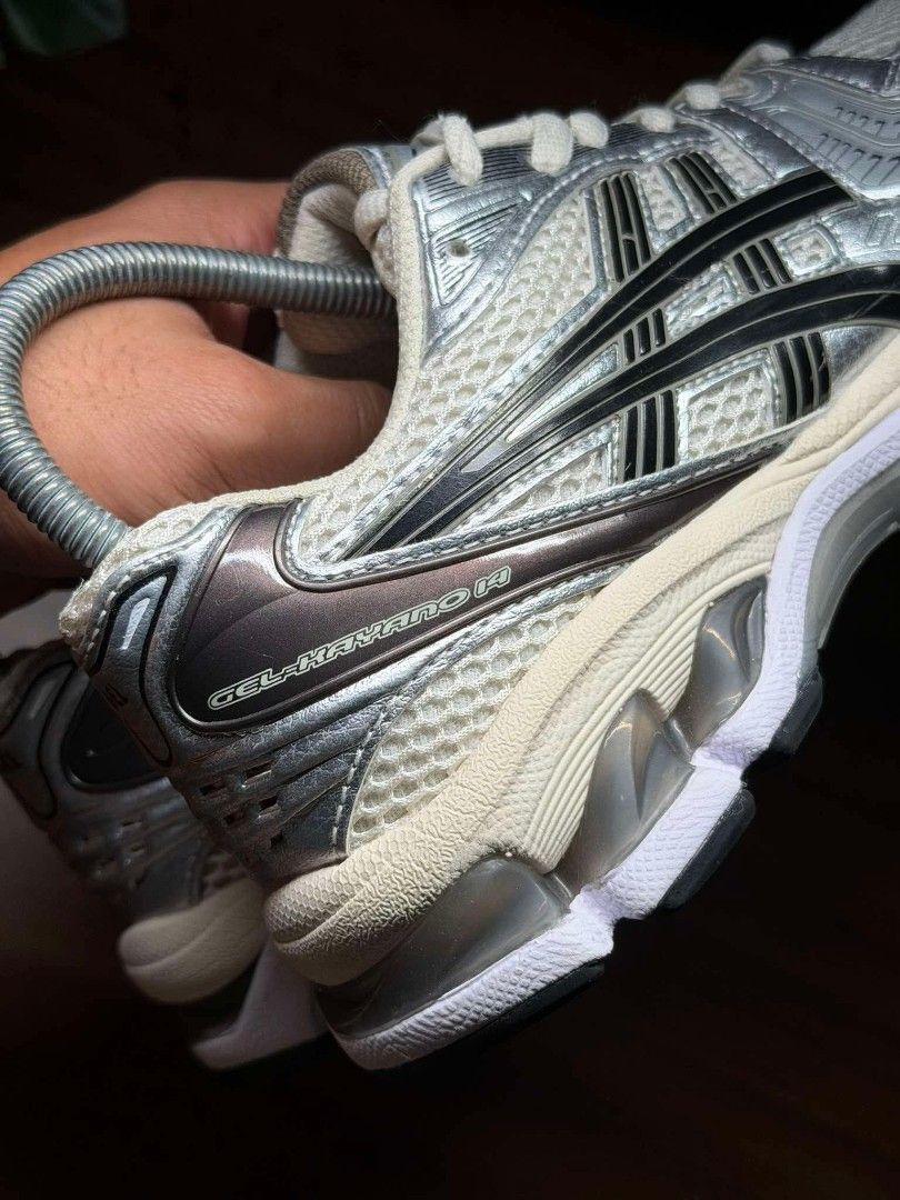 ASICS Gel-Kayano 14 Silver White (Category: Sneakers) located in Quezon City. Submitted by mksmchi_ (Listing ID 1449623459, Image 3). Description: - ASICS Gel-Kayano 14 - Color: Silver and White - Classic running shoe design - Breathable mesh upper with synthetic overlays - GEL cushioning for superior comfort - Versatile: perfect for everyday wear or athletic activities RFS: Too small :(.