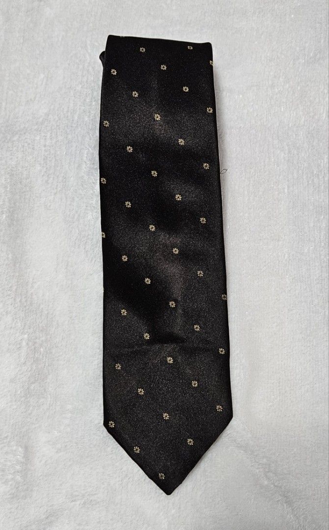 Austin Manor Dark Brown Polka Dot Silk Tie (Category: Ties) located in Caloocan City. Submitted by rm.diaz (Listing ID 1449660472, Image 1). Description: - Austin Manor Dark brown tie - Features small gold polka dots - Ideal for formal events or elevating an outfit.