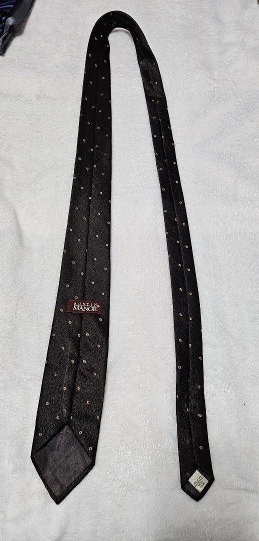 Austin Manor Dark Brown Polka Dot Silk Tie (Category: Ties) located in Caloocan City. Submitted by rm.diaz (Listing ID 1449660472, Image 3). Description: - Austin Manor Dark brown tie - Features small gold polka dots - Ideal for formal events or elevating an outfit.