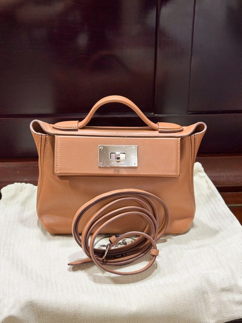 AUTHENTIC Hermes Mini 24/24 in Gold Leather PHW (Category: Luxury Bags & Wallets) located in Quezon City. Submitted by closetofcoco (Listing ID 1449636126, Image 1). Description: GUARANTEED AUTHENTIC PM FOR INQUIRIES NO LOW BALLING.