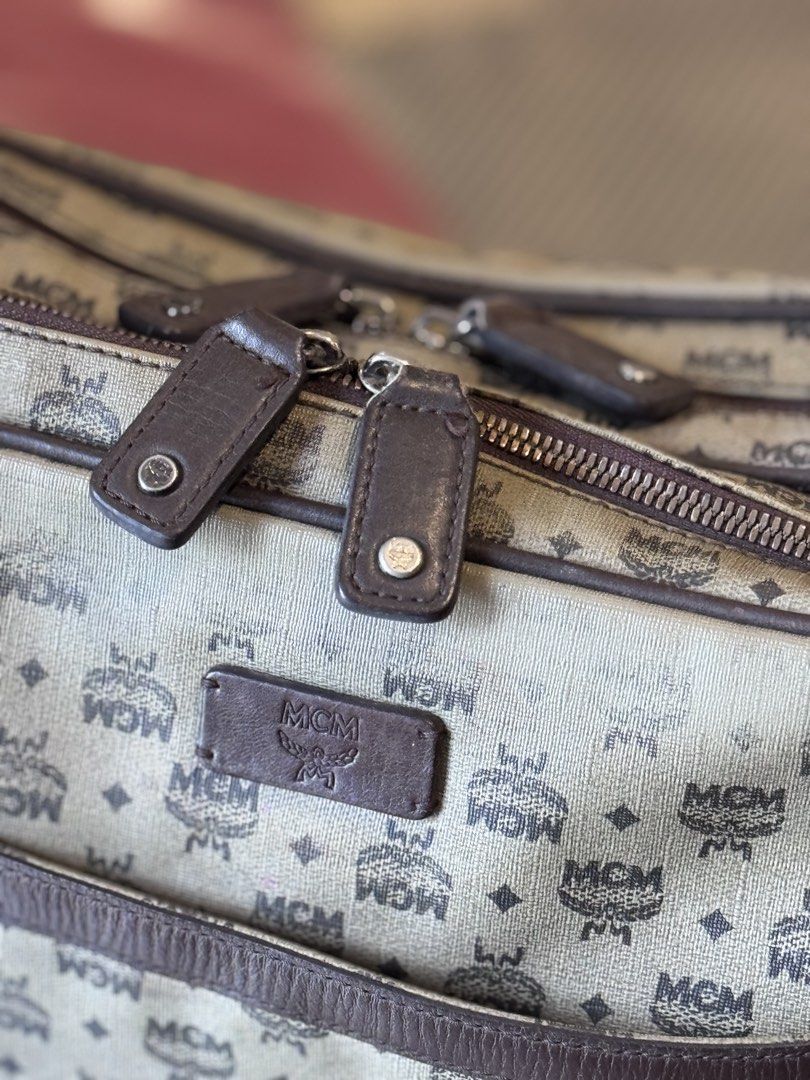 Authentic MCM crossbody messenger laptop bag (Category: Luxury Bags & Wallets) located in Manila. Submitted by thriftyhaven2023 (Listing ID 1449575537, Image 3). Description: See pictures for details. Has normal signs of usage. What you see is what you get ☺️ Ready to ship/pickup No major flaws other than the rubs in front as seen on picture..