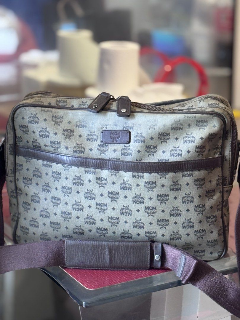 Authentic MCM crossbody messenger laptop bag (Category: Luxury Bags & Wallets) located in Manila. Submitted by thriftyhaven2023 (Listing ID 1449575537, Image 1). Description: See pictures for details. Has normal signs of usage. What you see is what you get ☺️ Ready to ship/pickup No major flaws other than the rubs in front as seen on picture..