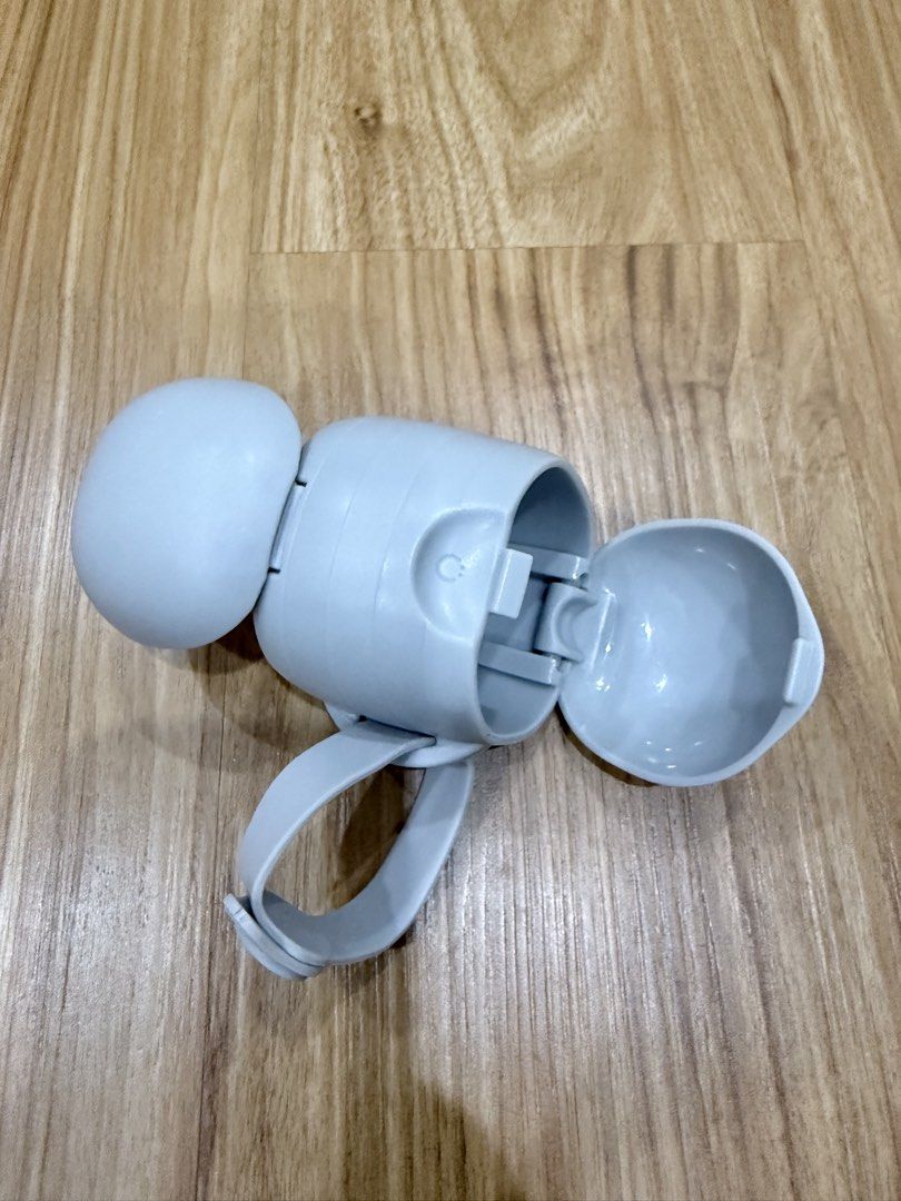 Baby Pacifier Holder Case with Strap (Category: Soothers & Pacifiers) located in Quezon City. Submitted by meandandy (Listing ID 1449620731, Image 2). Description: - Gray pacifier holder - Opens to store (2) pacifiers - Features a strap with a smiley face detail - Ideal for keeping pacifiers clean on the go - Easily attaches to bags or strollers.