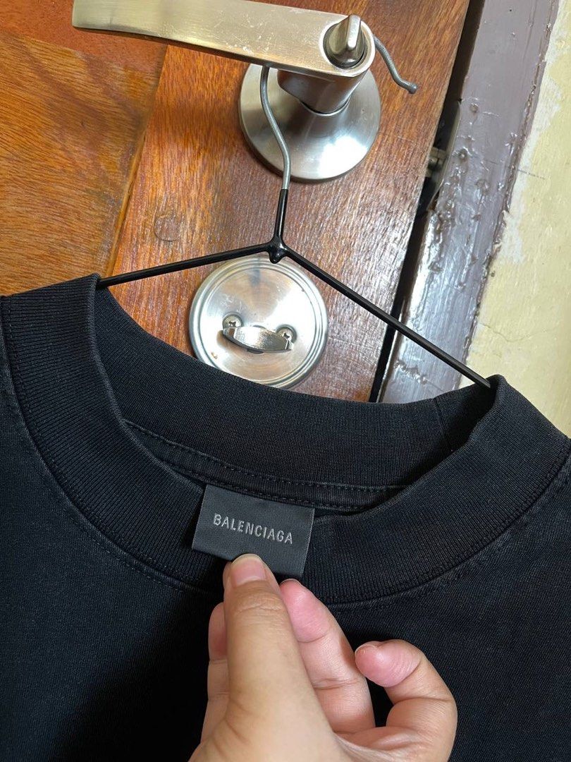 Balenciaga Interlock BB Logo Shirt (Category: Luxury Apparel) located in Baler. Submitted by definitelynotmics (Listing ID 1449539195, Image 2). Description: FOR SALE BALENCIAGA INTERLOCK BB LOGO OVERSIZED SHIRT SUPER NICE IN ACTUAL AUTHENTIC | ORIGINAL COLOR RATE 9/10 IN EXCELLENT CONDITION WASHED AND READY TO WEAR THICK FABRIC SIZE MEDIUM ON TAG WIDTH 22.5 INCHES | LENGTH 32.5 INCHES BEST FIT SIZE LARGE TO EXTRA LARGE BODY FRAME COMPLETE TAG AN