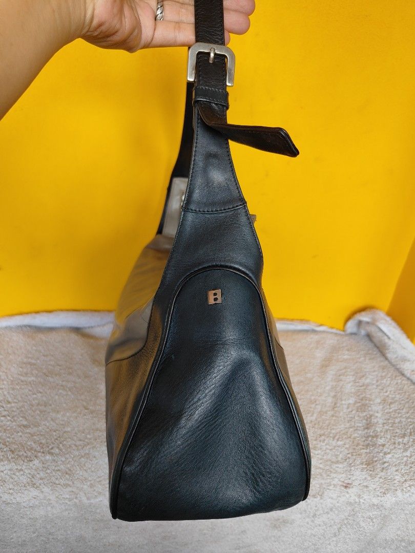 Bally Wo Leather Hobo Bag (Category: Luxury Bags & Wallets) located in Cebu City. Submitted by cherreymie70208 (Listing ID 1449539809, Image 3). Description: - Authentic Bally hobo bag - Genuine leather construction - Chic colorblock design (black & tan) - Adjustable strap with buckle closure - Secure top zipper - Signature Bally 'B' logo accent - Ideal for stylish everyday carry.