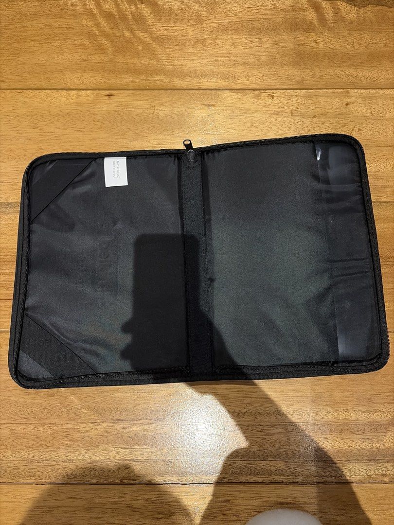 Belkin Black Tablet Sleeve with Strap (Category: Cases & Sleeves) located in Quezon City. Submitted by purplepproni (Listing ID 1449696588, Image 2). Description: - Belkin black tablet sleeve - Main zippered compartment - Carrying strap for easy transport - Internal elastic straps to secure your tablet - Ideal for protecting your tech while traveling.