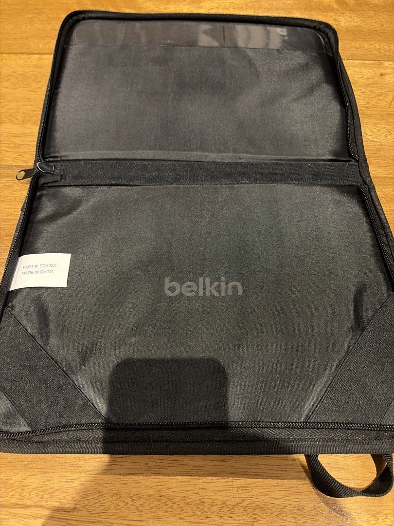 Belkin Black Tablet Sleeve with Strap (Category: Cases & Sleeves) located in Quezon City. Submitted by purplepproni (Listing ID 1449696588, Image 3). Description: - Belkin black tablet sleeve - Main zippered compartment - Carrying strap for easy transport - Internal elastic straps to secure your tablet - Ideal for protecting your tech while traveling.