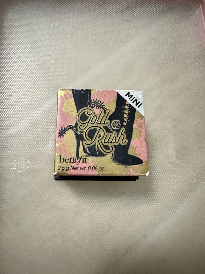 Benefit Cosmetics Mini Gold Rush Blush (Category: Makeup) located in Quezon City. Submitted by faststone.ba186f (Listing ID 1449567506, Image 1). Description: - Benefit Mini Gold Rush blush - Lovely peachy-pink shade - Subtle golden shimmer - Compact with built-in mirror - Ideal for a natural glow - Travel-friendly size.