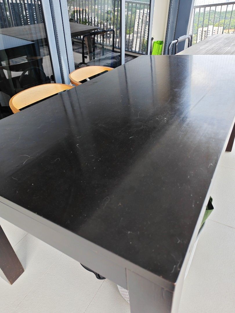 Black Solid Wood Dining Table (Category: Tables & Sets) located in Singapore. Submitted by feizai1020 (Listing ID 1449598917, Image 3). Description: - Black Solid Wood dining table - Size 180cm x90cm - still in good condition.