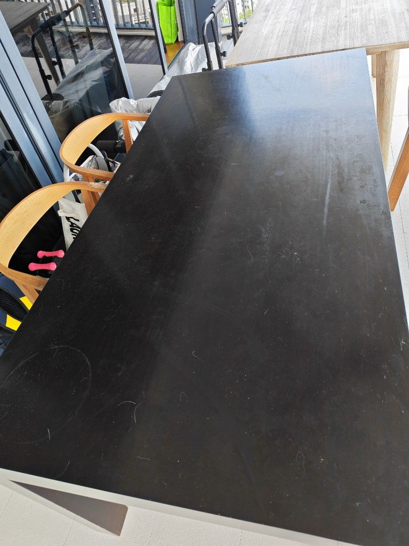 Black Solid Wood Dining Table (Category: Tables & Sets) located in Singapore. Submitted by feizai1020 (Listing ID 1449598917, Image 2). Description: - Black Solid Wood dining table - Size 180cm x90cm - still in good condition.