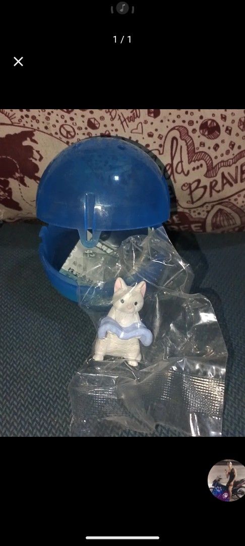 Blue Capsule Toy White Cat Figure (Category: Designer & Blind Box Toys) located in Manila. Submitted by kuakocarlo14 (Listing ID 1449636848, Image 1). Description: - Adorable white cat figure - Comes in a blue capsule - Still in original plastic packaging - Cat is wearing a light blue scarf/ribbon - Ideal for collectors or as a small gift - Includes the blue capsule.