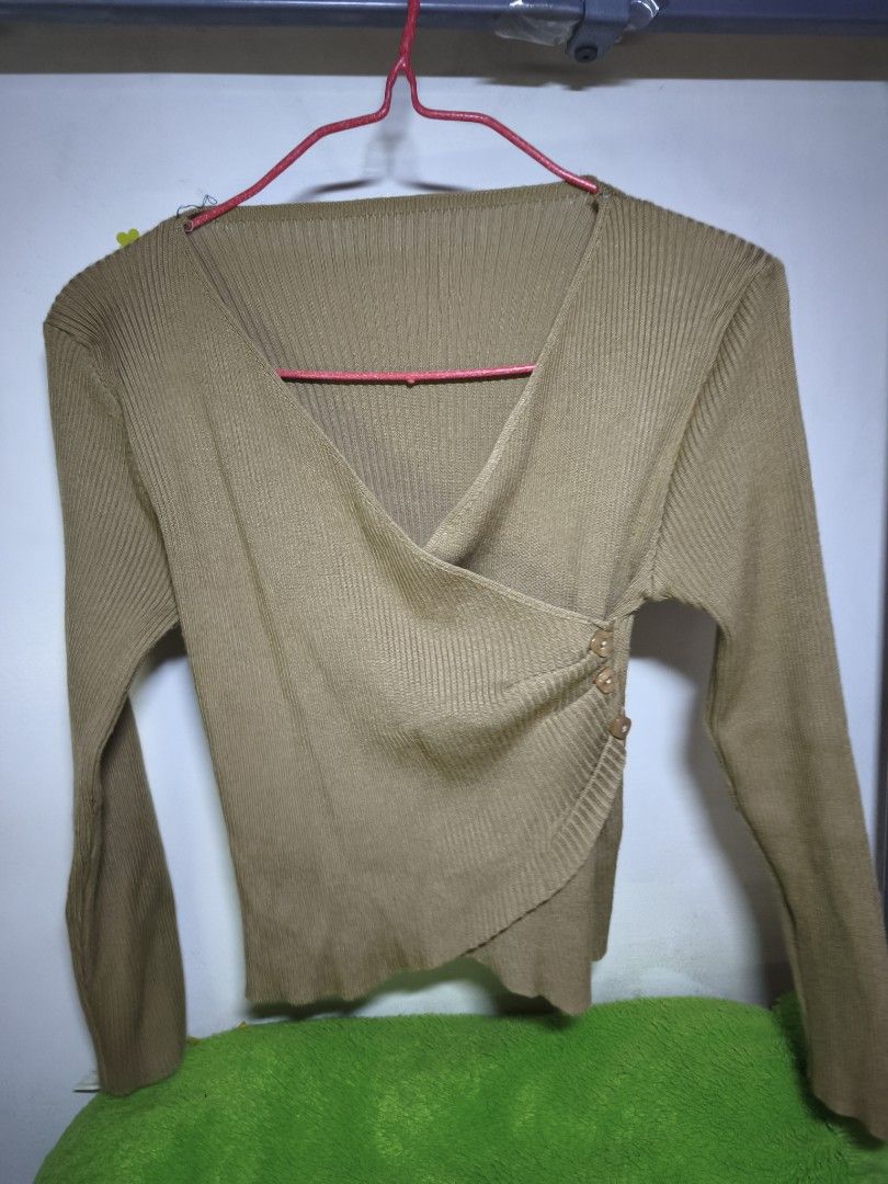 Brown Wrap Around Knitted Top (Category: Longsleeves) located in Manila. Submitted by letthingsgo_ (Listing ID 1449590158, Image 3). Description: knitted top with slight flaws makapal decorative buttons.