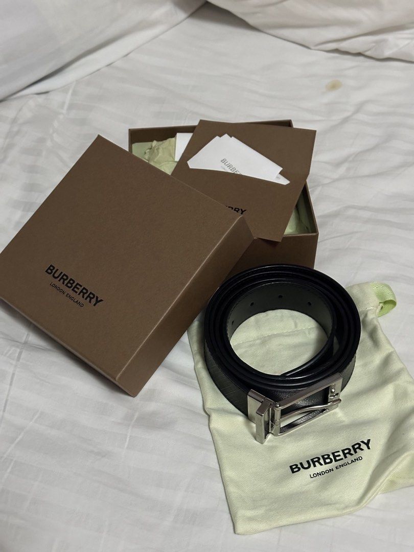 Burberry Reversible Belt with Silver Buckle (Category: Belts) located in Manila. Submitted by frzy009 (Listing ID 1449726420, Image 1). Description: - Authentic Burberry Belt - Reversible: Black on one side - Silver buckle with iconic Burberry logo - Made in Italy - Size: 44 / 110 - Complete Full Set — comes with the original Burberry box, dust bag, and product cards/paperwork as shown in the photos. - Hardware: Polished Silver-Tone Buckle (engra