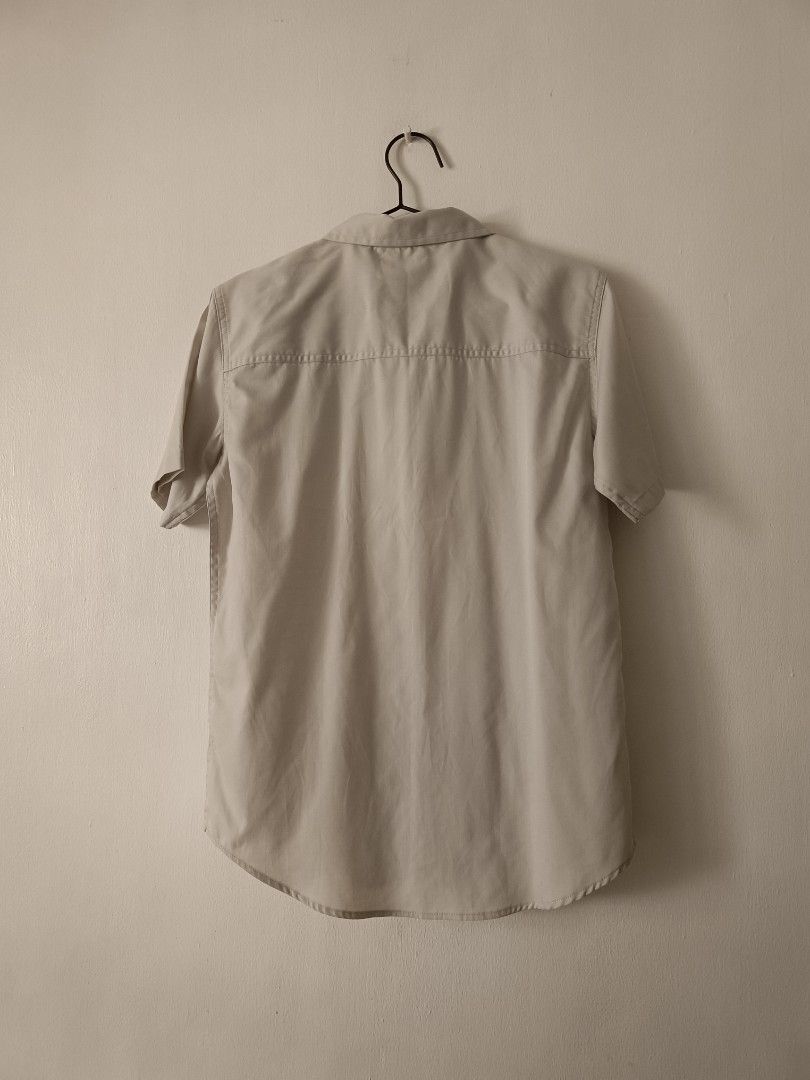 Calvin Klein Short Sleeve Button Up Shirt (Category: Formal Shirts) located in Manila. Submitted by shajanina.14 (Listing ID 1449597377, Image 3). Description: Calvin Klein Original New, with tag attached Large on tag As per measuring tape, Shoulder- 16 inches Bust- up to 38 inches Waist- up to 38 inches Length- 26 inches.